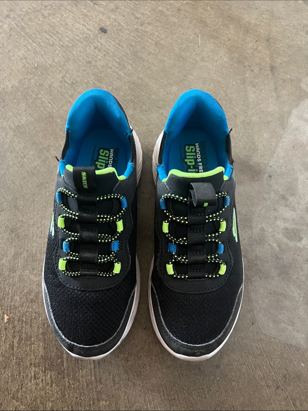 Skechers Black Sneakers with Blue and Neon Green Accents